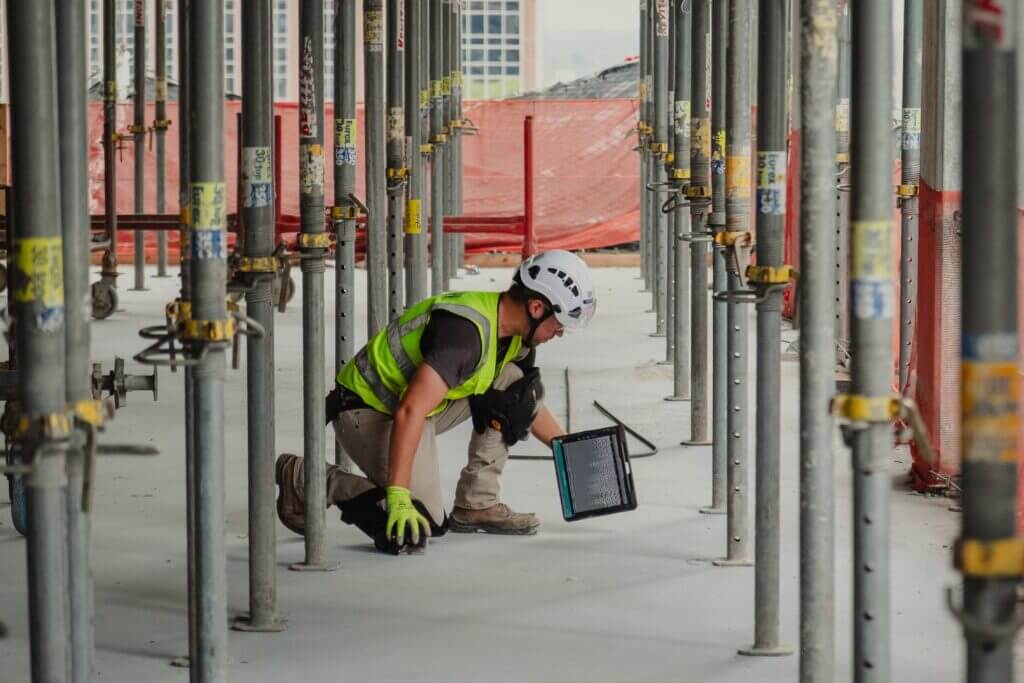 Skilled Ashton Sawing worker on a rooftop with a slab saw in Texas and Louisiana