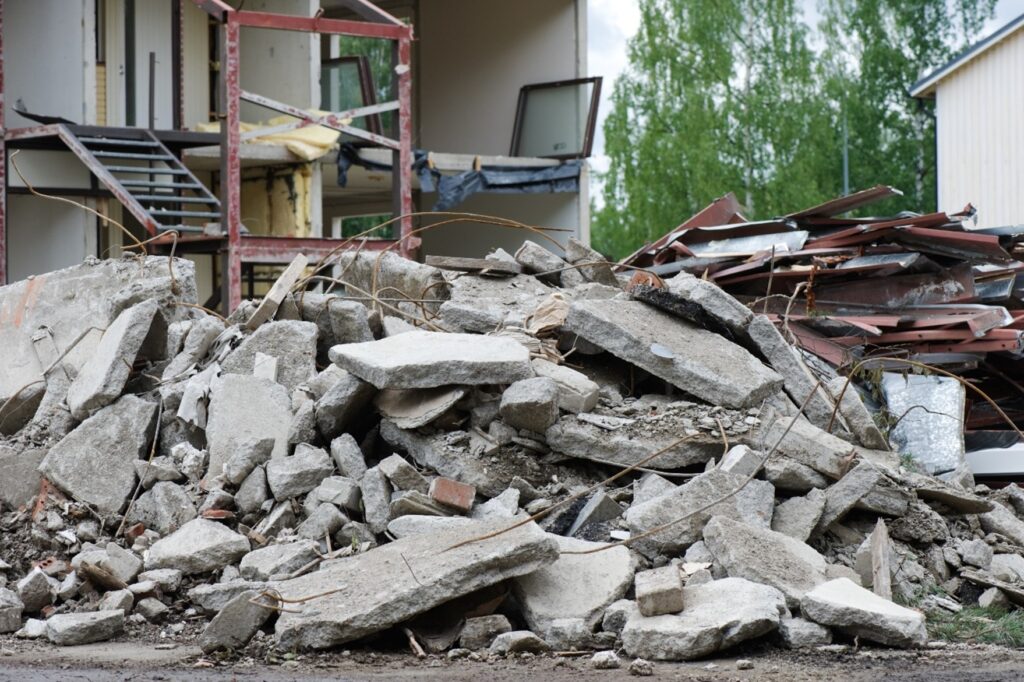 A pile of rubble next to a building